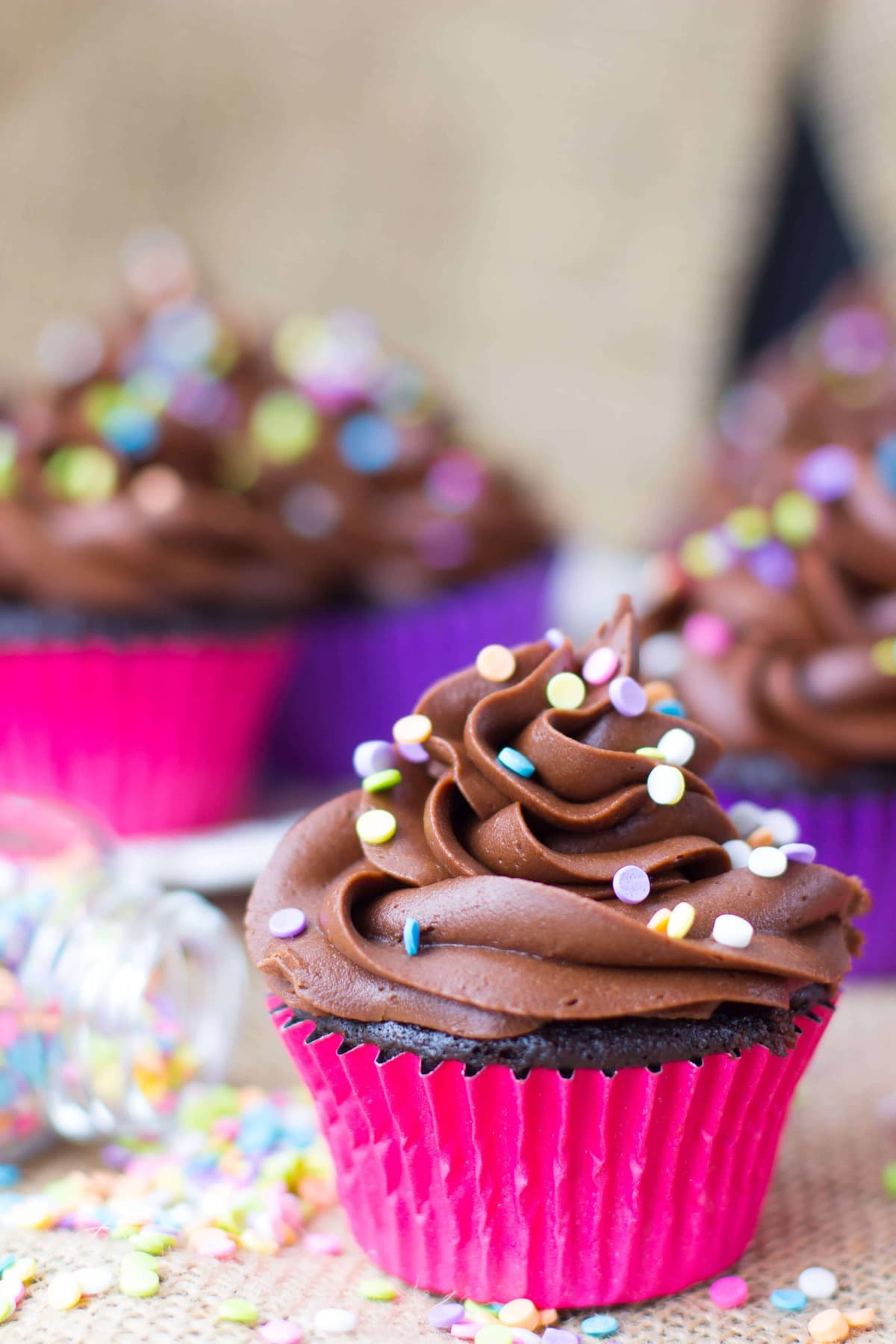 Dark Chocolate Cupcakes with Fresh Raspberry Frosting - Sugar Spun Run